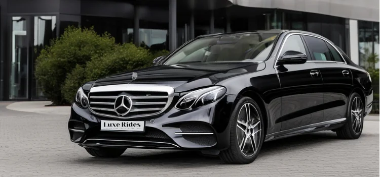 A high-end black Mercedes parked at a premium location, representing LuxeRides’ executive chauffeur service.