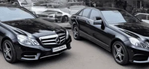 Two luxury black Mercedes vehicles from LuxeRides' high-end fleet, ready for chauffeur service.