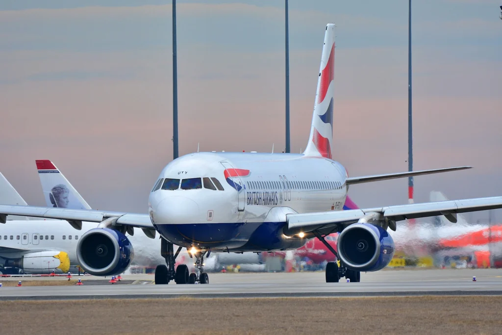 A British Airways aircraft at Manchester Airport, highlighting seamless luxury airport transfers.